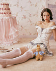 Lacemade lace trim dress - Sitting pose with Peter Rabbit plush toy