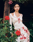 Rosevale Slip Knitted Top (White) - Close-up of scalloped edges and bow details