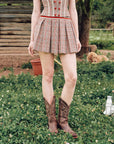 Close-up of red velvet ribbon trim on "St. Paul Crimson Berry" skirt