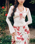 Front view of Rosevale Slip white knitted halter neck top