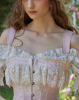 "Bloom in Coral Island" floral dress - Close-up of pink fishbone corset bodice and lace trim
