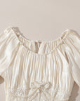 Lacemade "Du Cocon au Papillon" - Pearl neckline and petal cutouts