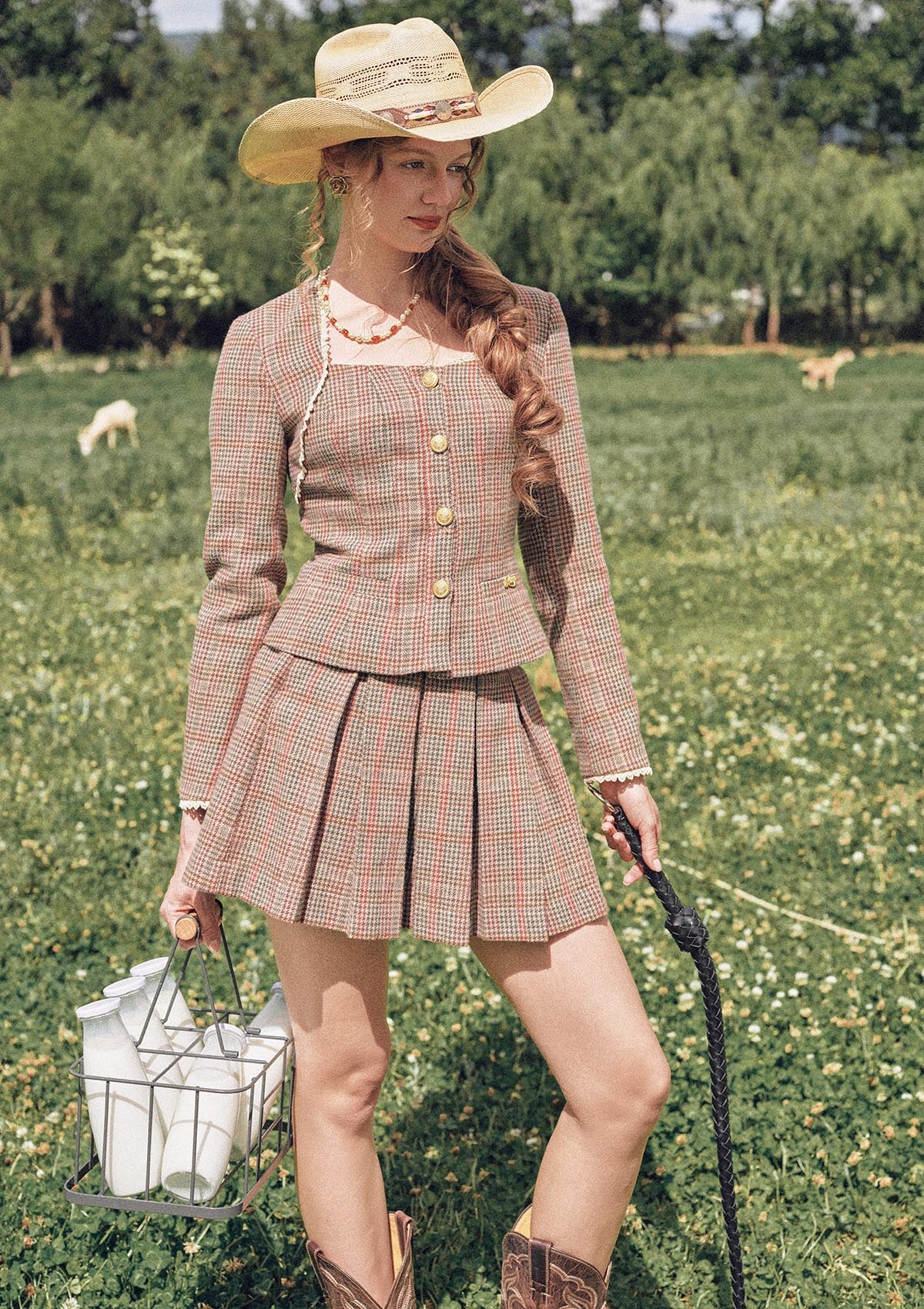 Front view of "St. Paul Crimson Berry" houndstooth pleated skirt