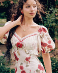 Lace-paneled cup and underbust ruffle detail of Rosevale Dress B