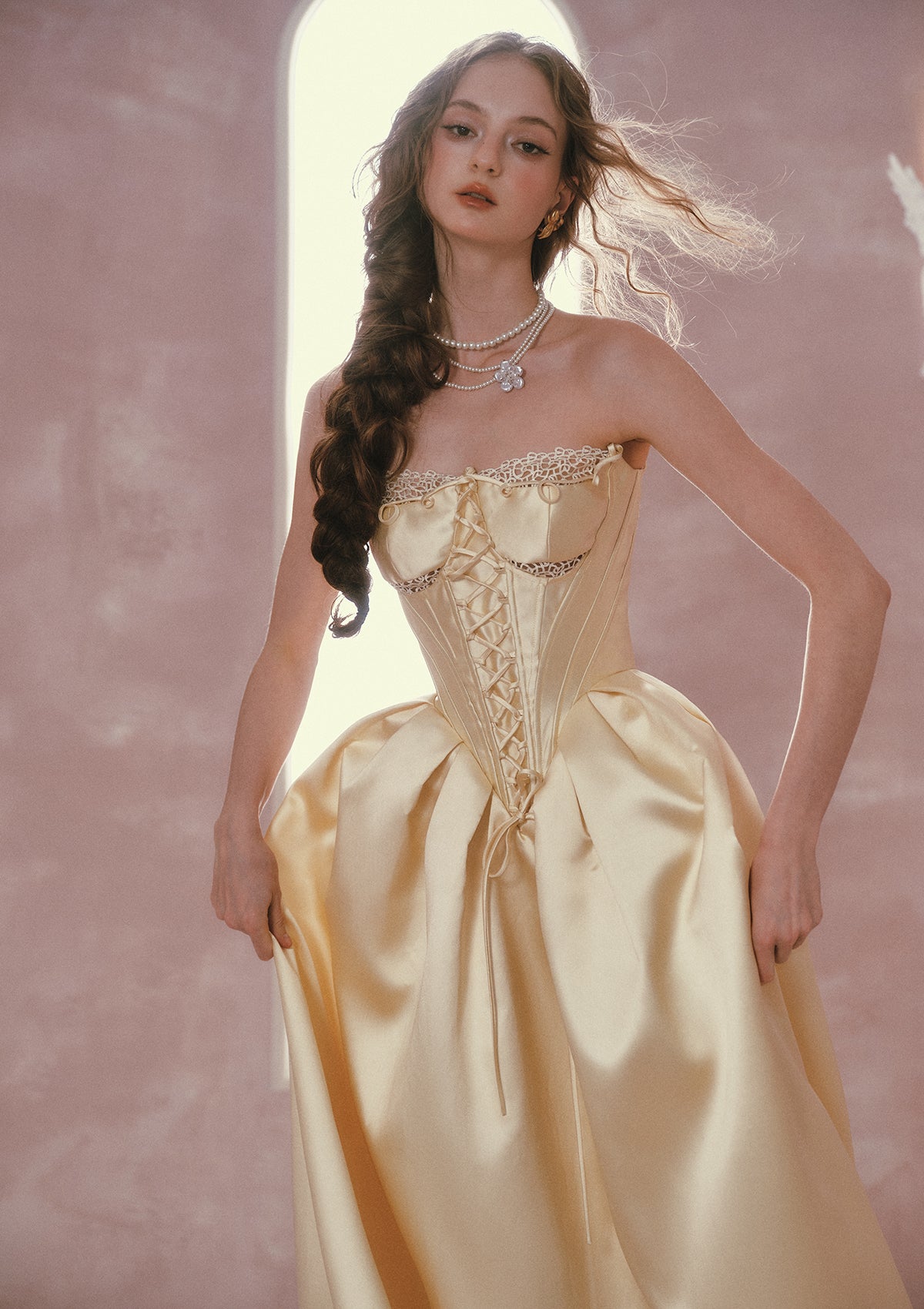 Lacemade champagne satin dress featuring a deep V basque waistline