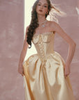 Lacemade champagne satin dress featuring a deep V basque waistline