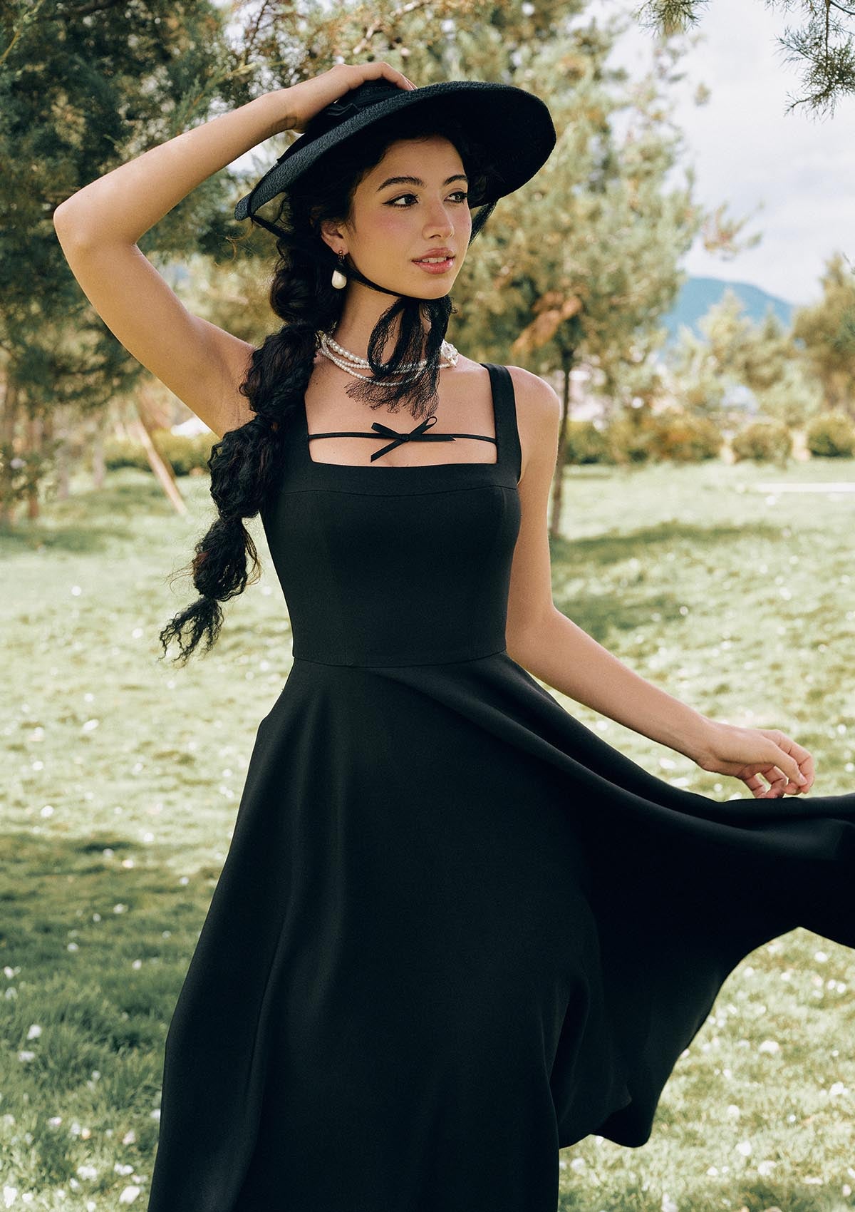 Front view of Beyond Campus black sleeveless A-line maxi dress
