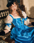 V-shaped waistline detail on Lacemade Sapphire Corset Gown