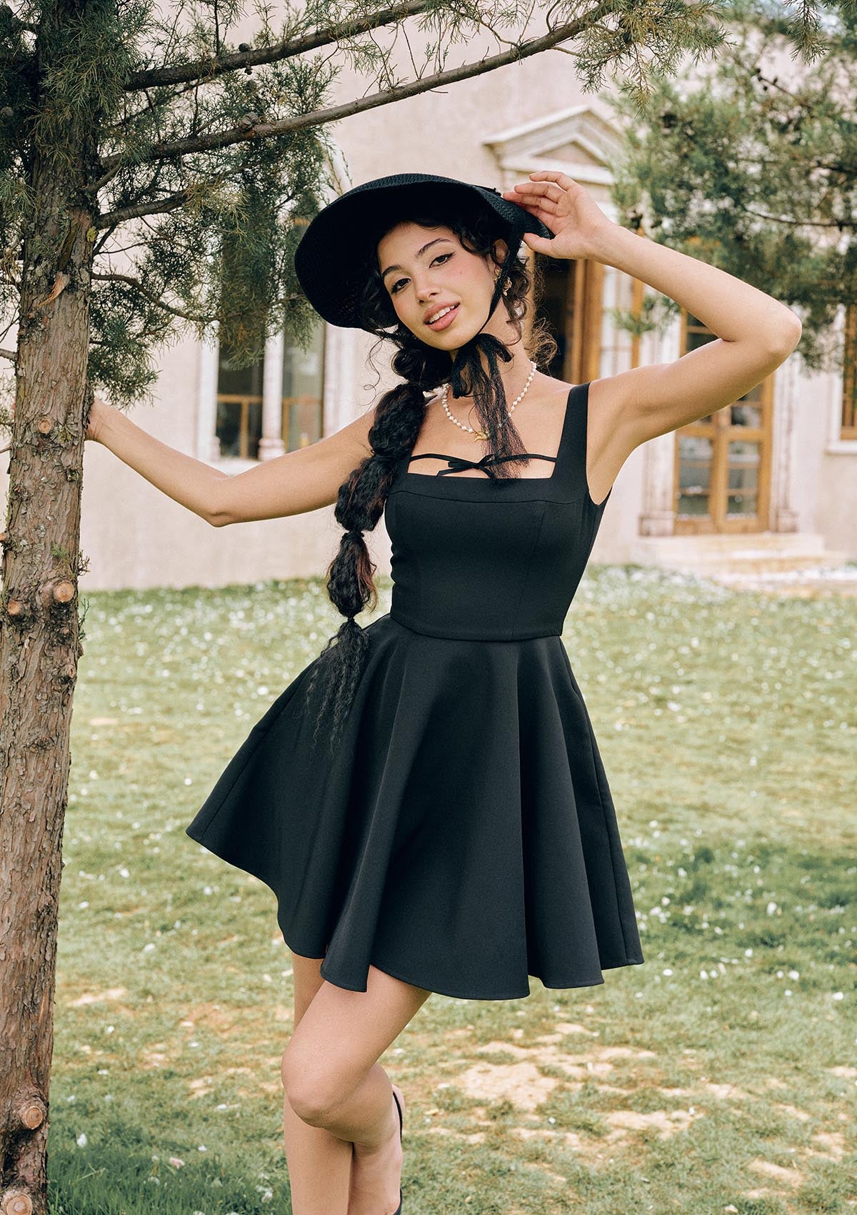 Lacemade "Beyond Campus" Structured black sleeveless mini dress