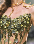 "Eucalyptus Fairy" green corset - Close-up of 3D floral appliqués and rhinestone details